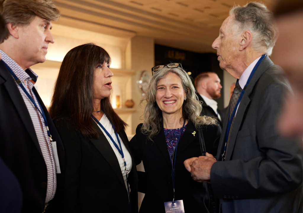 ELNET-US regional director and supporters in conversation at an ELNET-US event